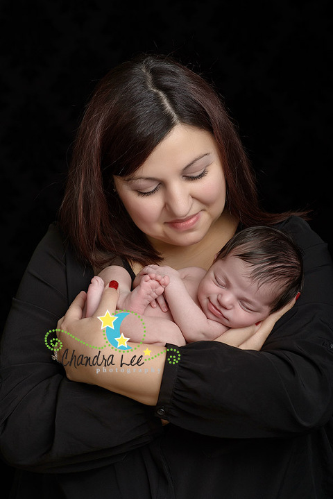 Picture of Baby Smiling in Mom's Arms